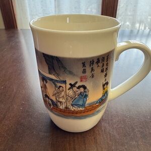 Elegant White Ceramic Mug with Artistic Design